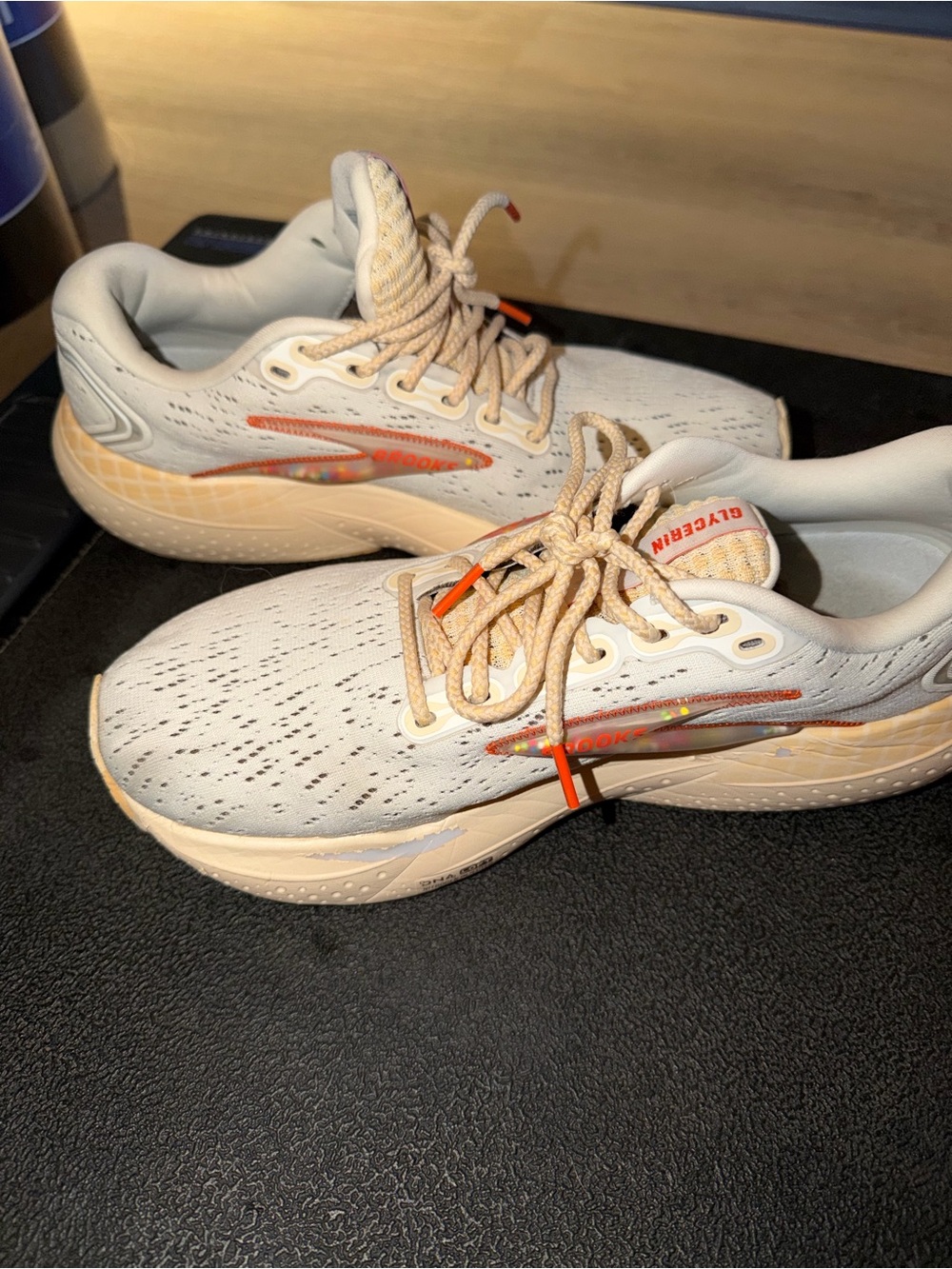 Brooks Women Athletic Sneakers in Cream with Orange Accent